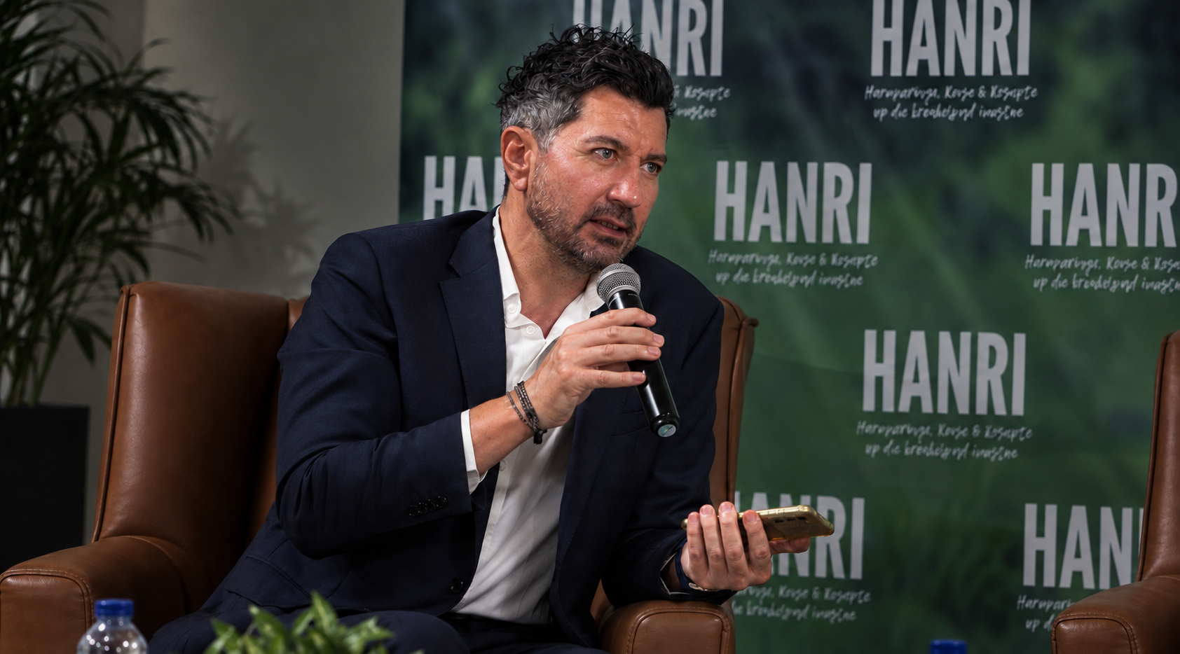 Bennum moderating a discussion